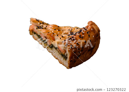Pieces of quiche with salmon, spinach or broccoli, salt and spices Pieces of quiche with salmon, spinach or broccoli, salt and spices 123270322