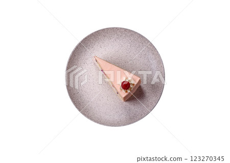 Piece of sweet cake with pink cream with raspberry flavor, with shortbread, cheesecake Piece of sweet cake with pink cream with raspberry flavor, with shortbread, cheesecake 123270345