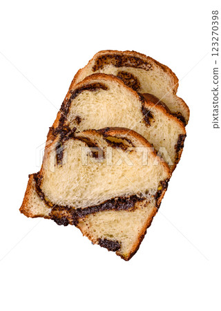 Sweet poppy seed cake on a dark concrete background Sweet poppy seed cake on a dark concrete background 123270398