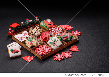Delicious sweet gingerbread, madeleine biscuits and other elements of Christmas decorations 123270505