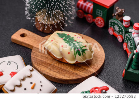Sweet madeleine sponge cookies covered with colored chocolate Sweet madeleine sponge cookies covered with colored chocolate 123270588