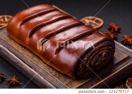 Sweet homemade roll with poppy seeds 123270717