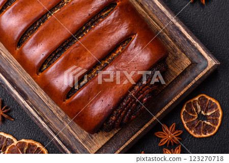 Sweet homemade roll with poppy seeds 123270718