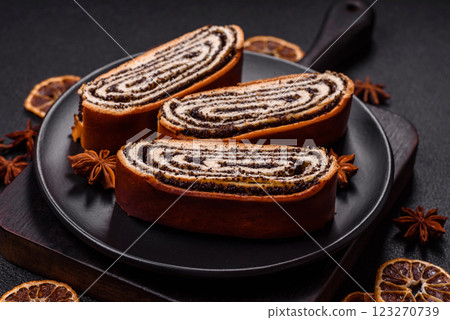 Sweet homemade roll with poppy seeds 123270739