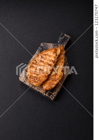 Grilled chicken fillet with salt, spices and herbs Grilled chicken fillet with salt, spices and herbs 123270747