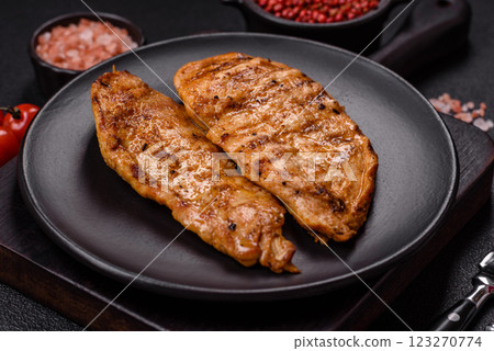 Grilled chicken fillet with salt, spices and herbs 123270774