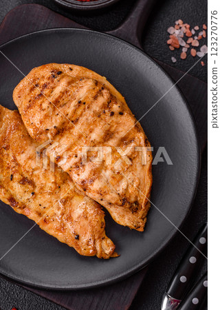 Grilled chicken fillet with salt, spices and herbs 123270776