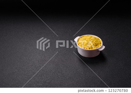 Italian arborio risotto rice with salt, spices and herbs Italian arborio risotto rice with salt, spices and herbs 123270780