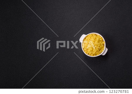 Italian arborio risotto rice with salt, spices and herbs Italian arborio risotto rice with salt, spices and herbs 123270781