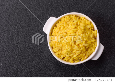 Italian arborio risotto rice with salt, spices and herbs Italian arborio risotto rice with salt, spices and herbs 123270784