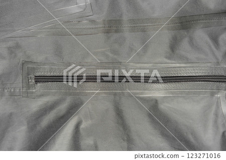 Outerwear fabric. Taped seams of fabric. Waterproof fabric with taped seams. Clothing made of waterproof fabric. 123271016