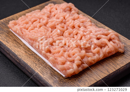 Raw minced chicken with salt, spices and herbs 123271029