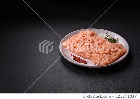 Raw minced chicken with salt, spices and herbs 123271037