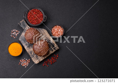 Beef burger patties with salt, spices and herbs Beef burger patties with salt, spices and herbs 123271071