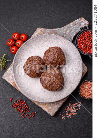 Beef burger patties with salt, spices and herbs 123271084