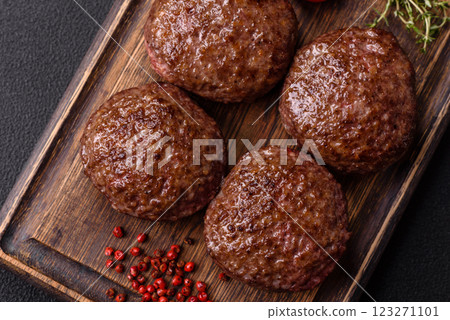 Beef burger patties with salt, spices and herbs 123271101