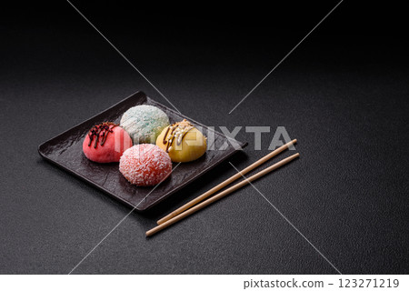 Delicious colorful asian mochi sweets with rice dough shell and fruit filling 123271219