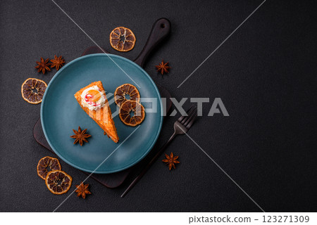 Piece of sweet layer cake with pumpkin or citrus flavor with cream Piece of sweet layer cake with pumpkin or citrus flavor with cream 123271309