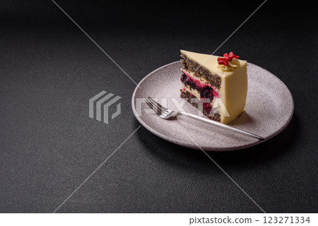 Piece of sweet layered cheesecake with cherries and poppy seeds 123271334
