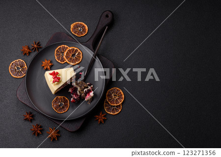 Piece of sweet layered cheesecake with cherries and poppy seeds Piece of sweet layered cheesecake with cherries and poppy seeds 123271356