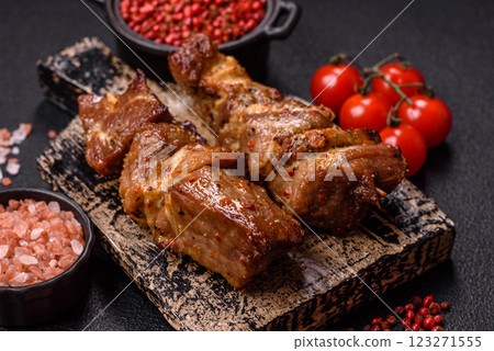 Delicious grilled chicken, turkey or pork skewers with salt, spices and herbs Delicious grilled chicken, turkey or pork skewers with salt, spices and herbs 123271555