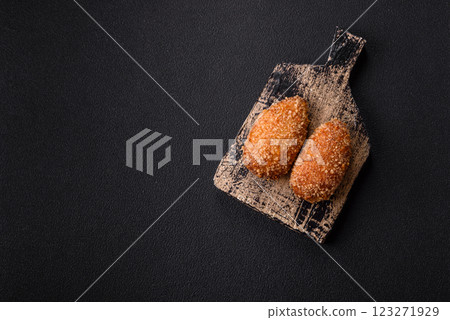 Delicious fresh cutlet or meatball Kiev style with filling Delicious fresh cutlet or meatball Kiev style with filling 123271929