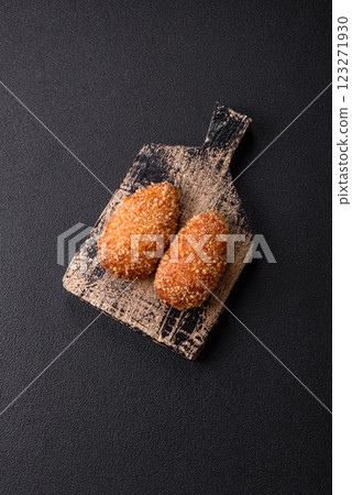 Delicious fresh cutlet or meatball Kiev style with filling 123271930