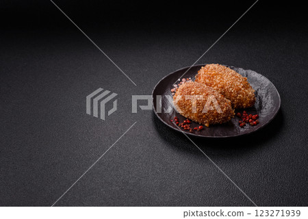 Delicious fresh cutlet or meatball Kiev style with filling 123271939