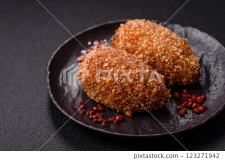 Delicious fresh cutlet or meatball Kiev style with filling Delicious fresh cutlet or meatball Kiev style with filling 123271942