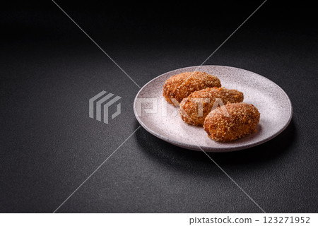 Delicious fresh cutlet or meatball Kiev style with filling 123271952
