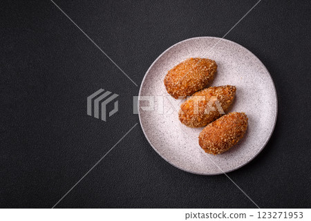 Delicious fresh cutlet or meatball Kiev style with filling Delicious fresh cutlet or meatball Kiev style with filling 123271953