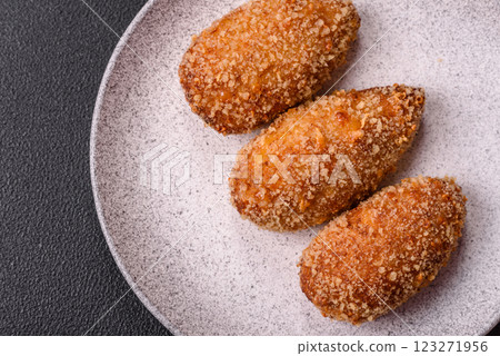 Delicious fresh cutlet or meatball Kiev style with filling 123271956