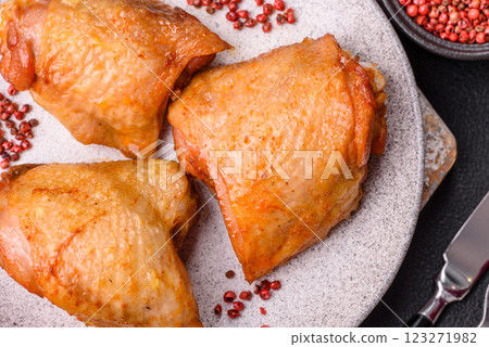 Chicken thighs fried with salt, spices and herbs 123271982