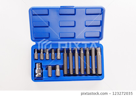 A set of single-sided chrome steel bits in a blue plastic box A set of single-sided chrome steel bits in a blue plastic box 123272035