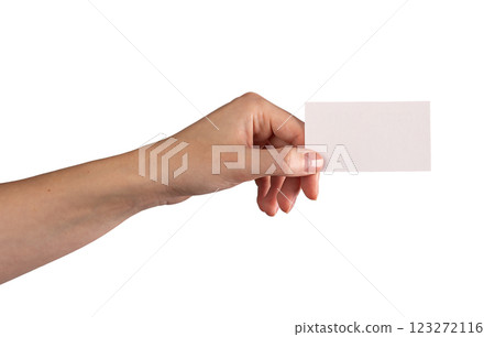 Female hand holding a blank business card, fingers positioned to present it forward. Symbolizing 123272116