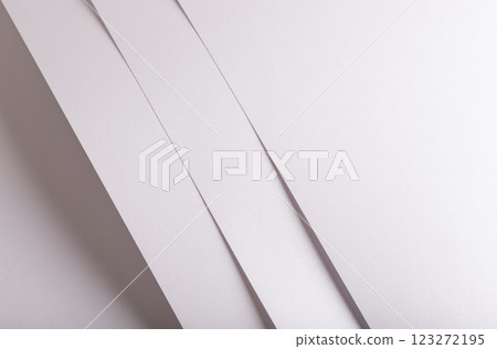 White, pearl, and silver paper with a satin, glossy finish. Sleek, smooth texture and premium White, pearl, and silver paper with a satin, glossy finish. Sleek, smooth texture and premium 123272195