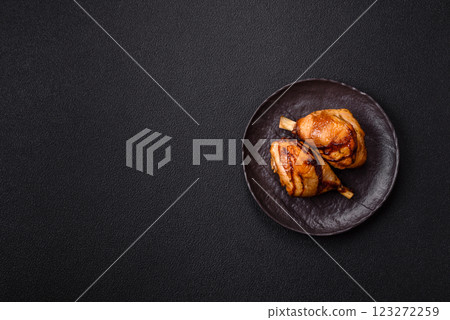Delicious grilled chicken legs with spices and herbs in teriyaki sauce 123272259