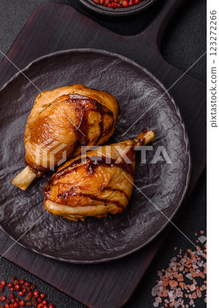 Delicious grilled chicken legs with spices and herbs in teriyaki sauce 123272266