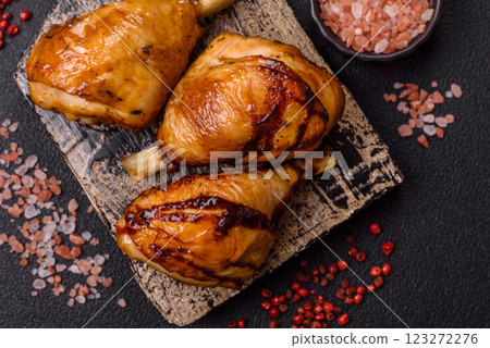 Delicious grilled chicken legs with spices and herbs in teriyaki sauce 123272276
