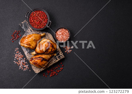 Delicious grilled chicken legs with spices and herbs in teriyaki sauce Delicious grilled chicken legs with spices and herbs in teriyaki sauce 123272279