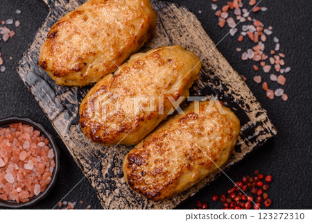 Delicious fresh fried minced fish cutlets with spices and herbs 123272310