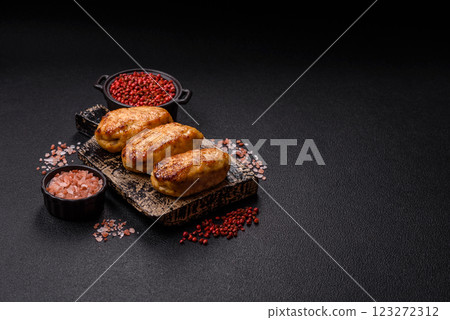 Delicious fresh fried minced fish cutlets with spices and herbs 123272312