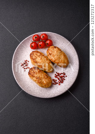 Delicious fresh fried minced fish cutlets with spices and herbs 123272317