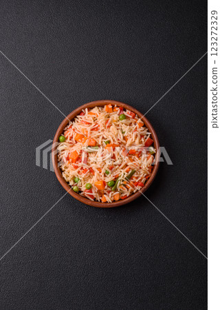 Boiled rice with vegetables, salt and spices Boiled rice with vegetables, salt and spices 123272329