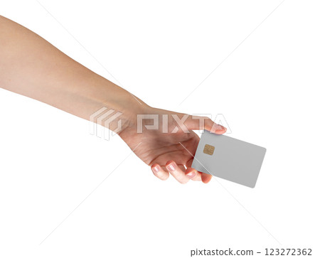 Female hand holding a credit card with a chip, symbolizing cashless payment, shopping, or financial 123272362
