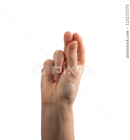 Female hand making an Orthodox religious gesture, thumb, index, and middle fingers together 123272373