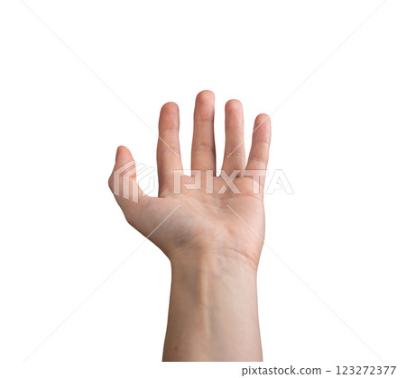Female hand outstretched with fingers apart, palm open in a reaching or offering gesture. 123272377