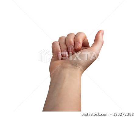 Female hand with neatly manicured nails, fingers slightly curled in a subtle beckoning or grasping Female hand with neatly manicured nails, fingers slightly curled in a subtle beckoning or grasping 123272398