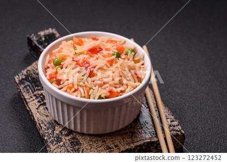 Boiled rice with vegetables, salt and spices Boiled rice with vegetables, salt and spices 123272452