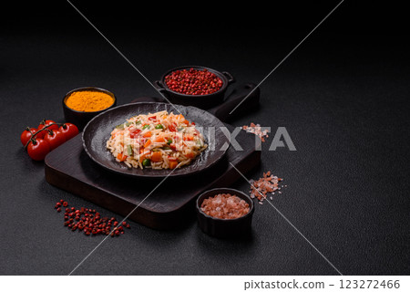 Boiled rice with vegetables, salt and spices Boiled rice with vegetables, salt and spices 123272466